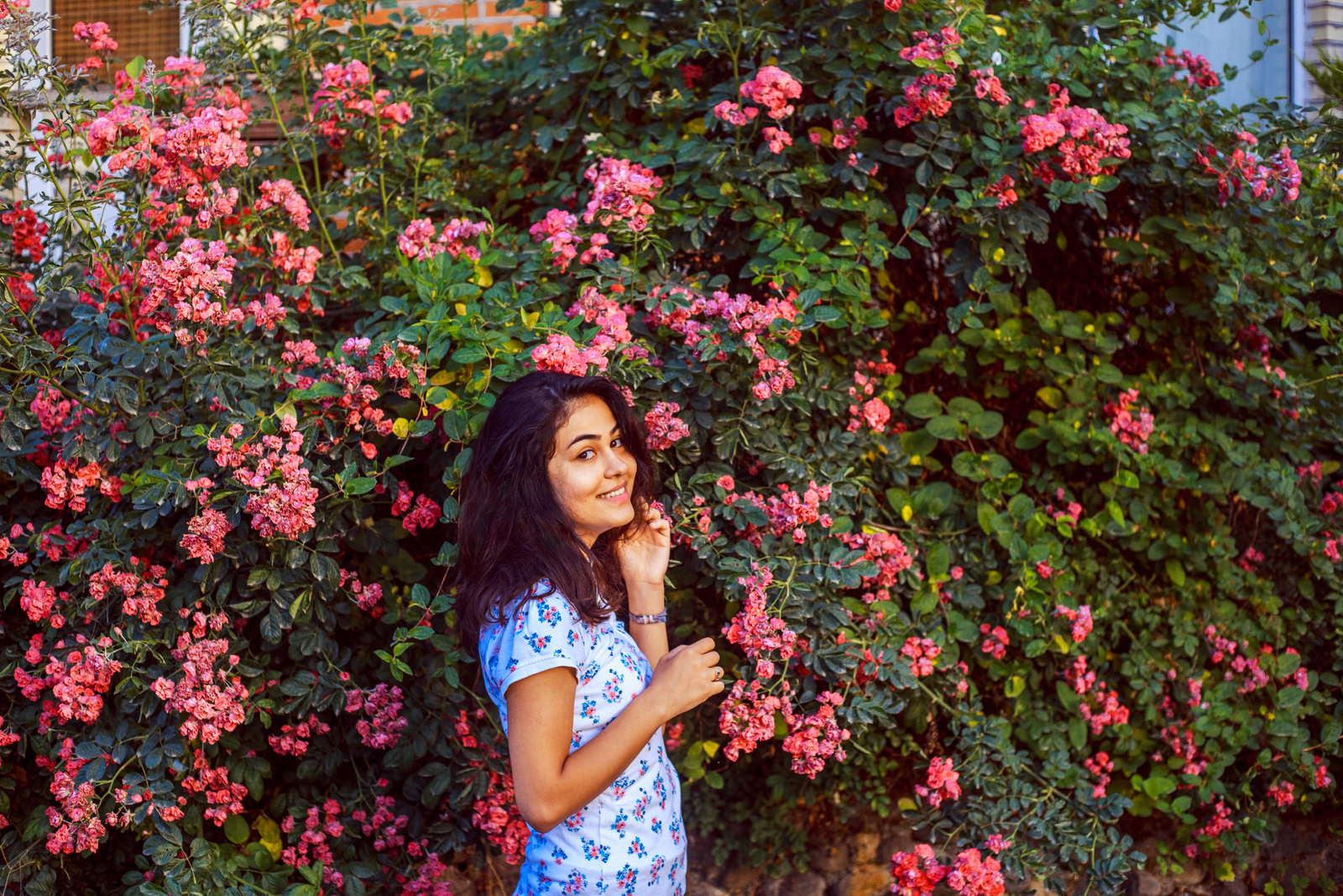 Portrait among pink flowers